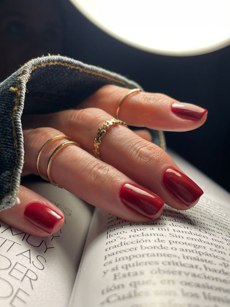 Red nail extensions and nail art by Makeupify